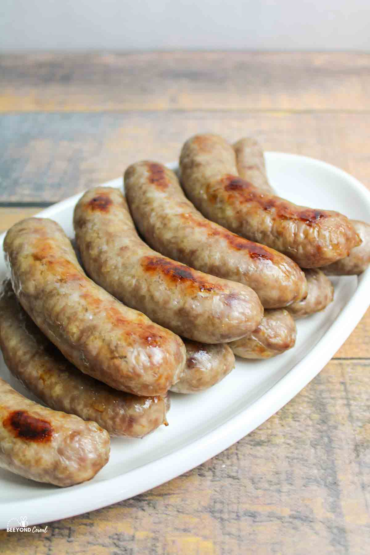 a platter full of brats turned at an angle