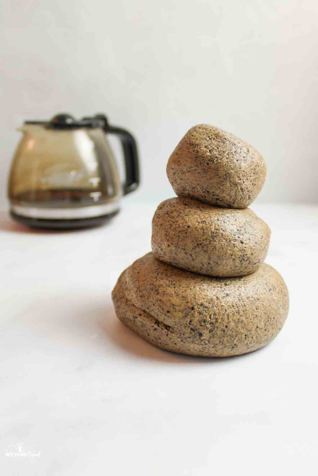 stacked balls of coffee playdough.