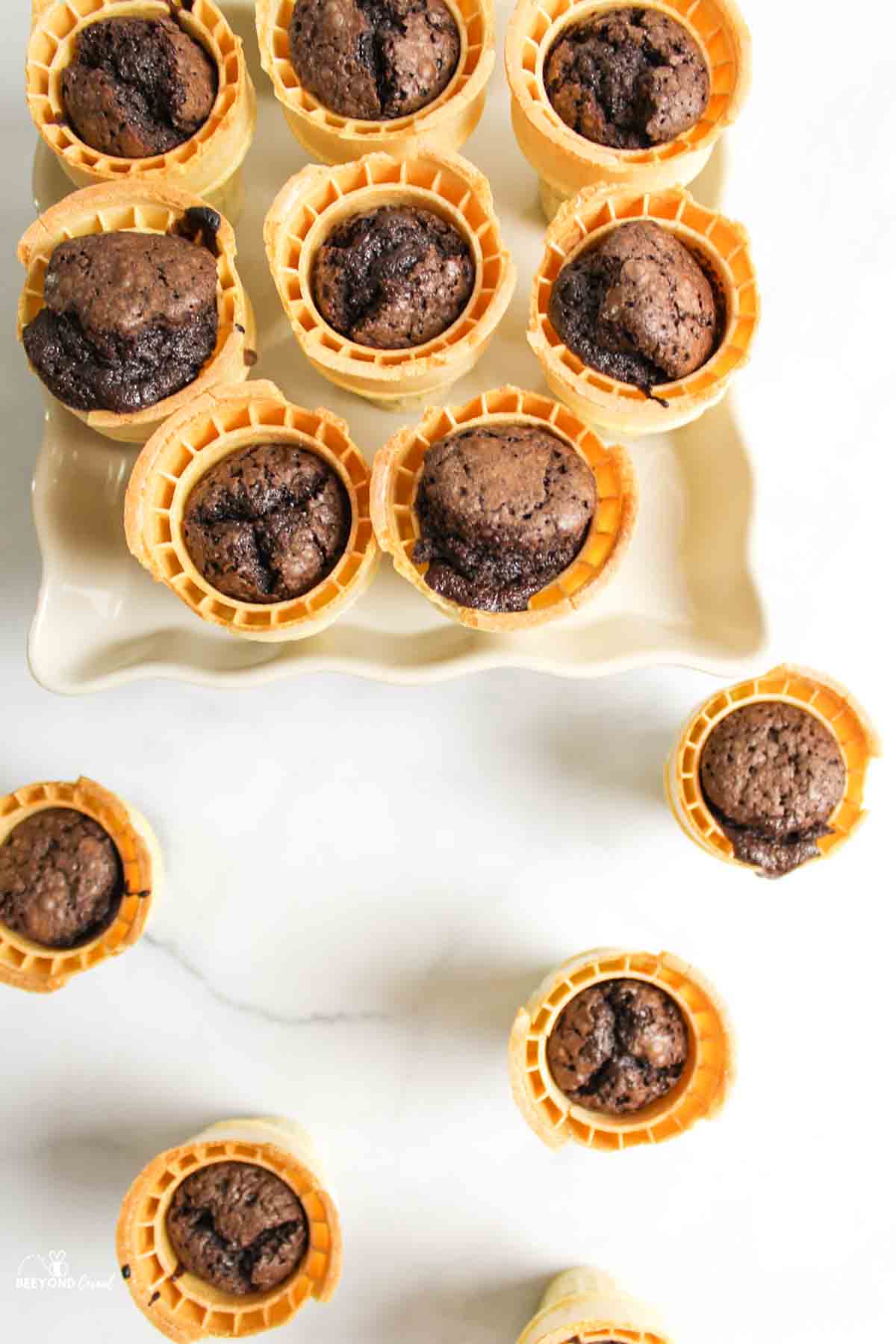 two ice cream topped brownie cones