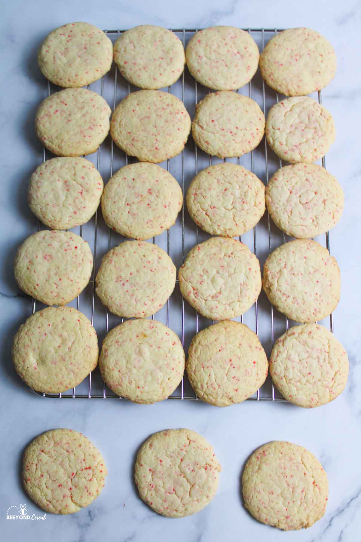 cherry chip cookies on and off of a wire cooling rack.