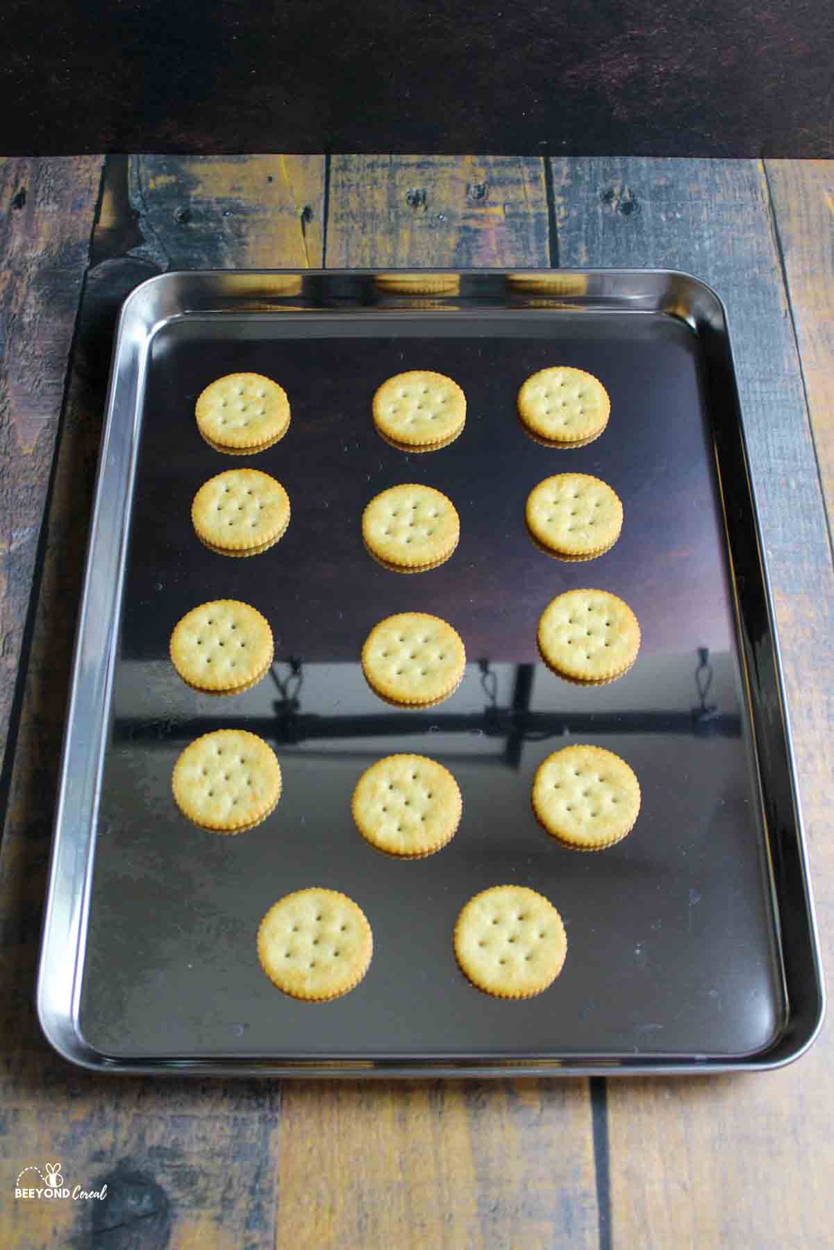 ritz crackers on baking sheet.