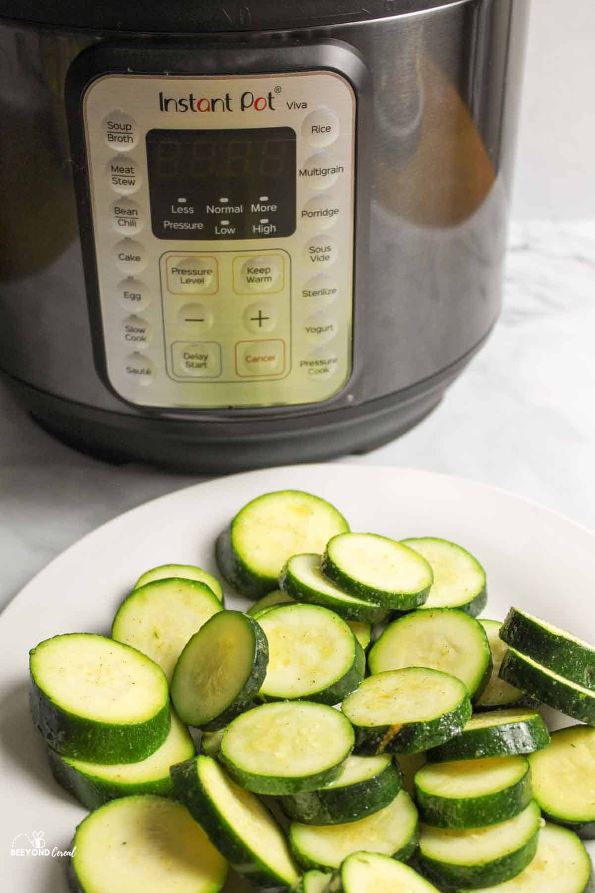 steamed zucchini in front of instant pot.