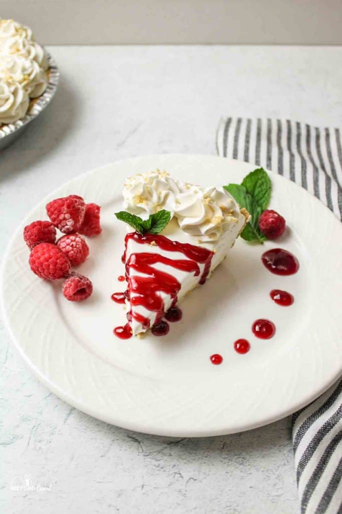a no bake strawberry cheesecake with strawberry glaze on top