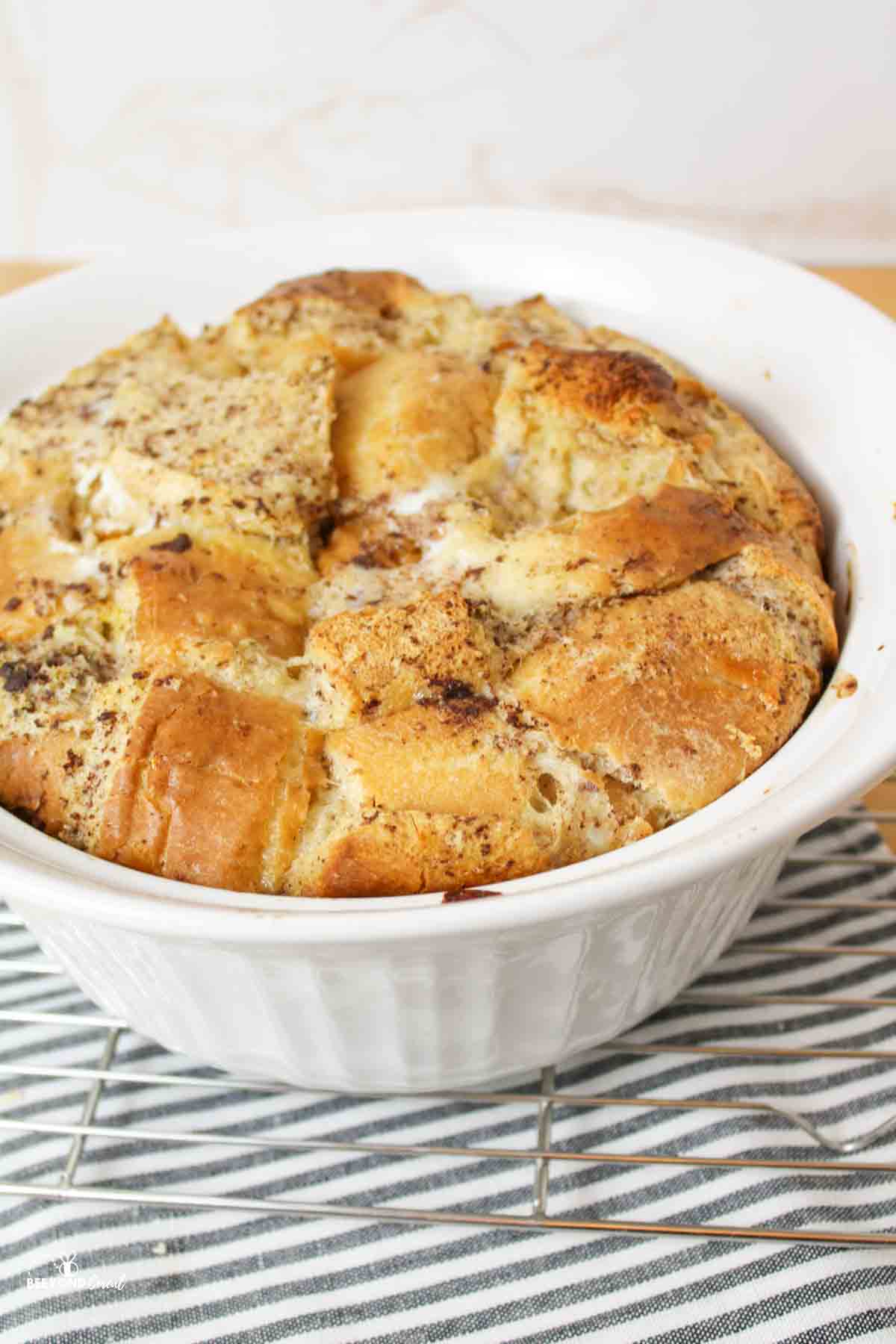 bread pudding in a white casserole dish.