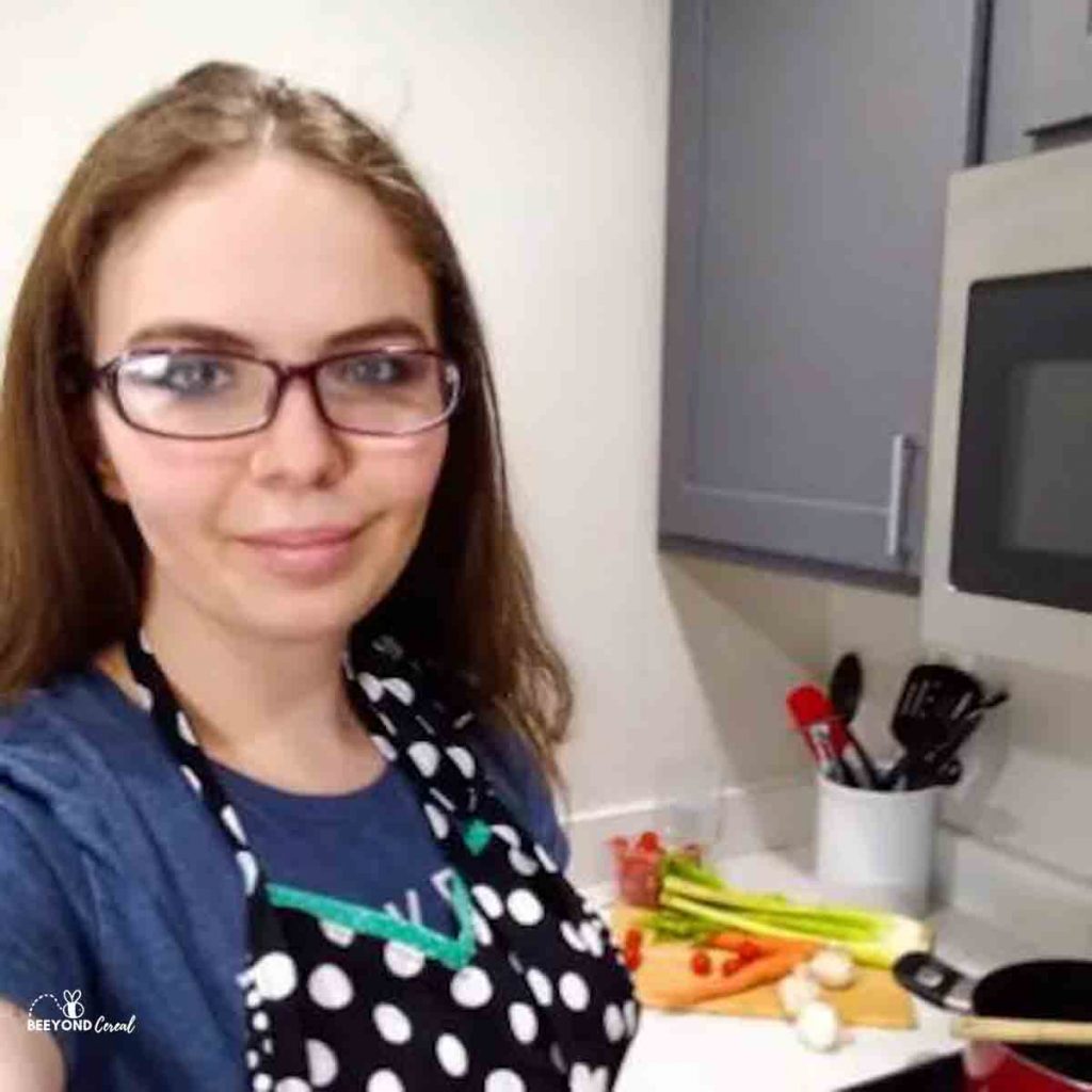 a picture of nicole in the kitchen cooking