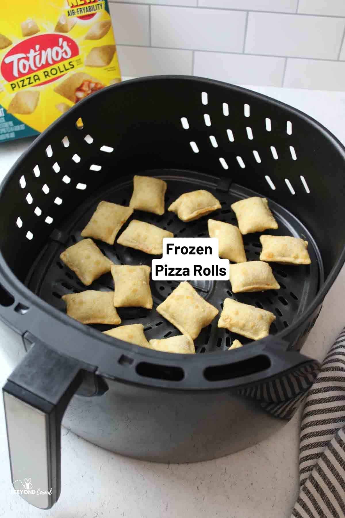 an air fryer basket filled with pizza rolls