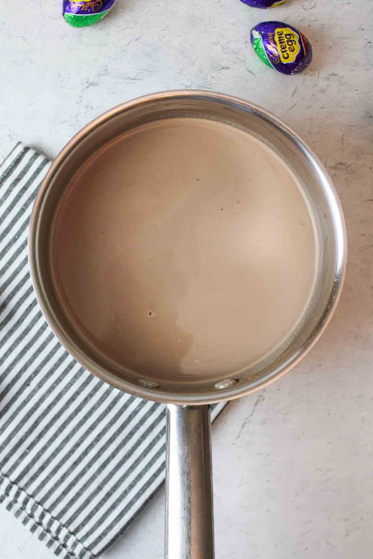 hot chocolate mixture in a metal pot