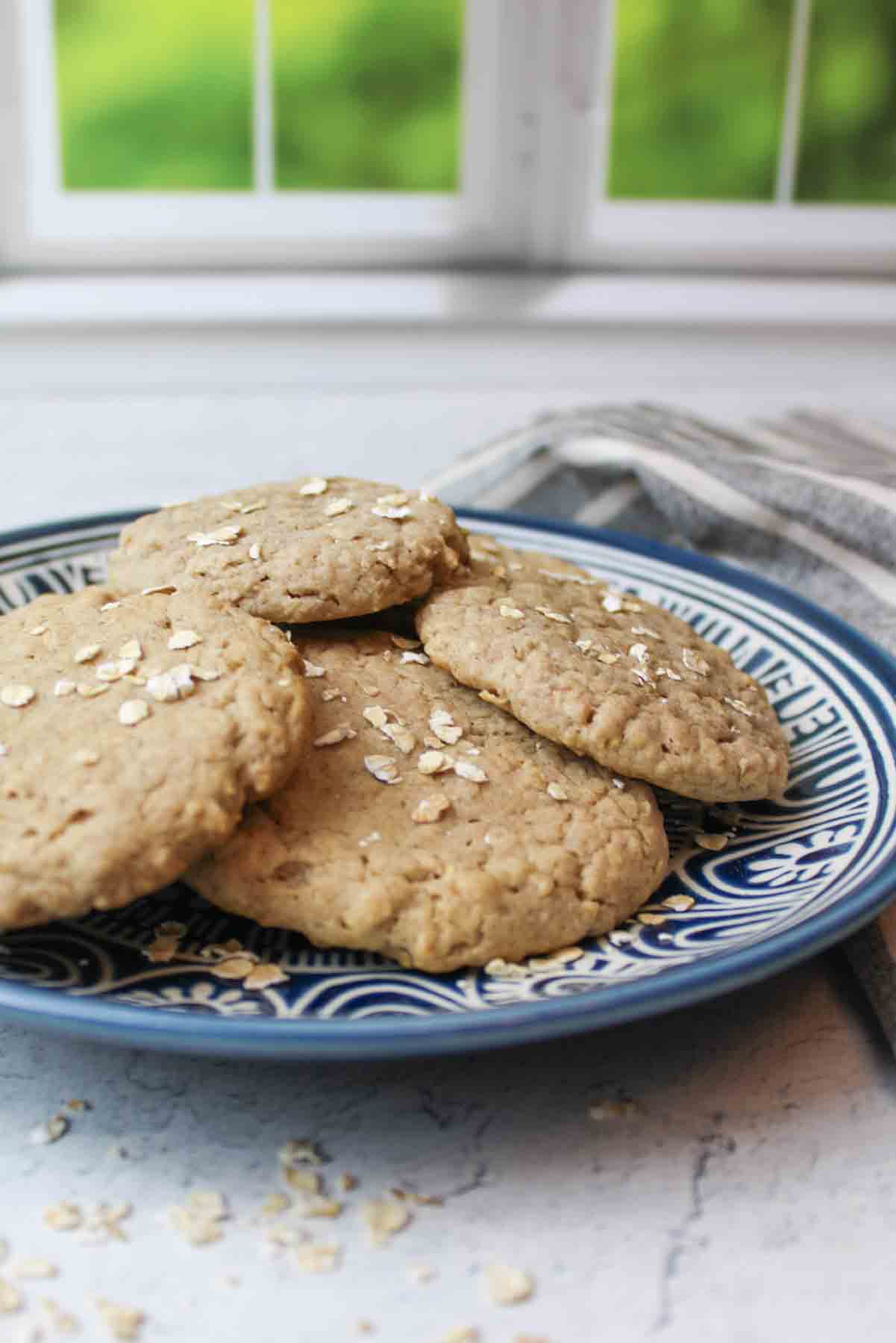 a plate of 4 ingredient oatmeal cookies on a blue plate