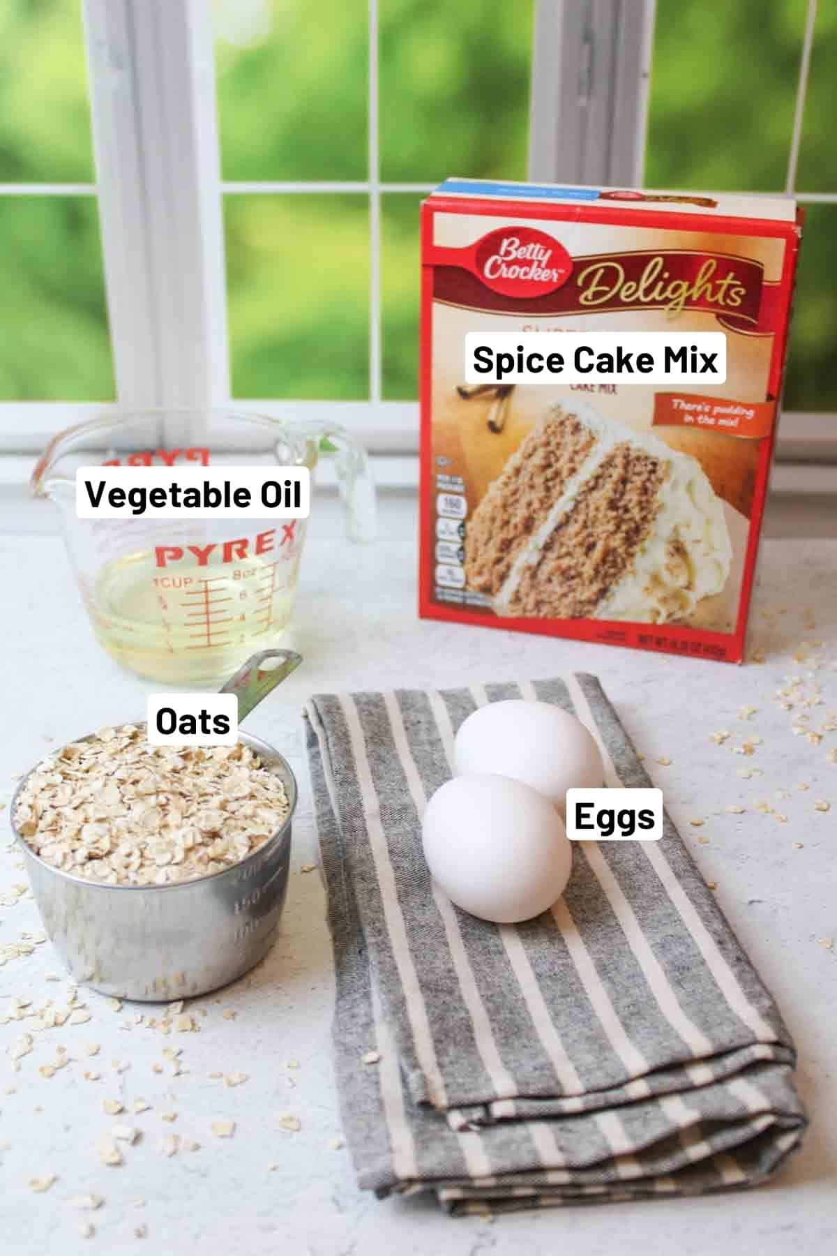 ingredients needed to make 4 ingredient oatmeal cake mix cookies.