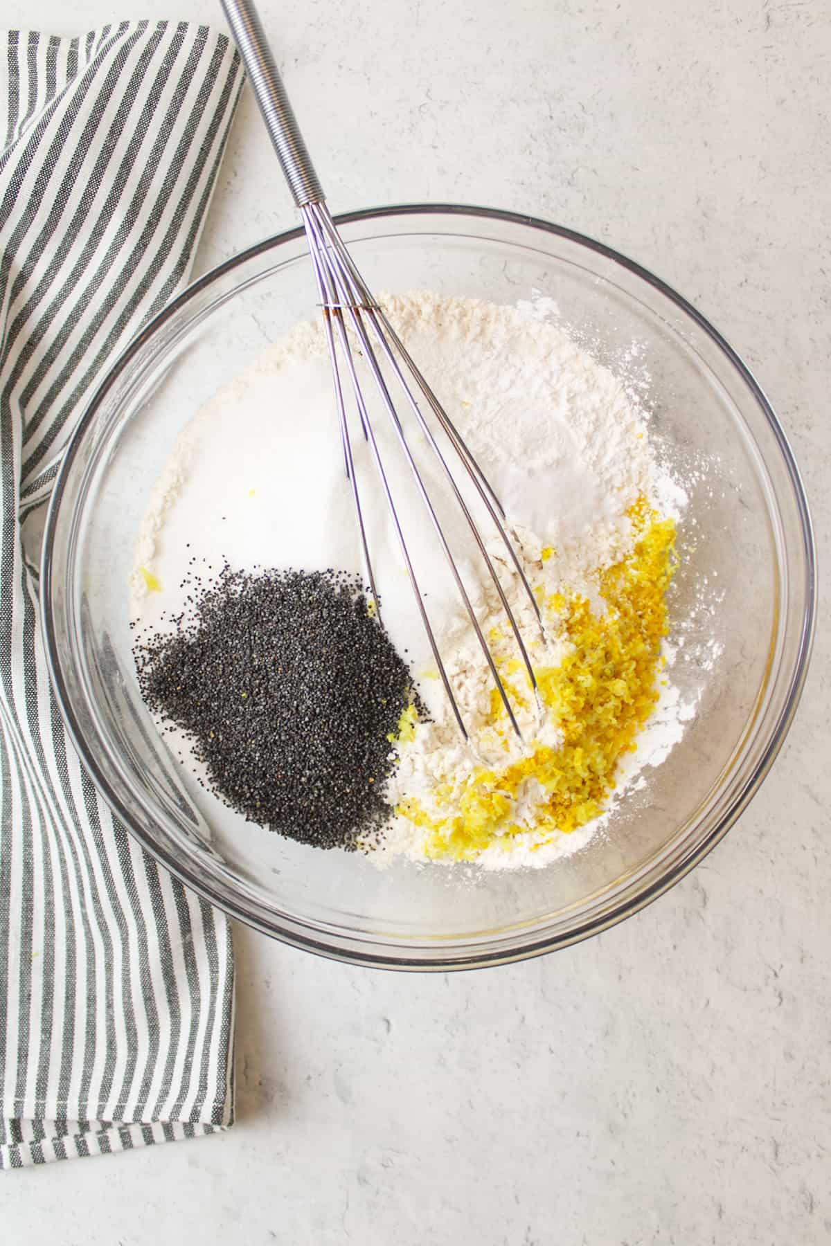 dry ingredients in a mixing bowl with a whisk.