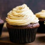 Peanut Butter Cream Cheese Frosting on a chocolate cupcake.