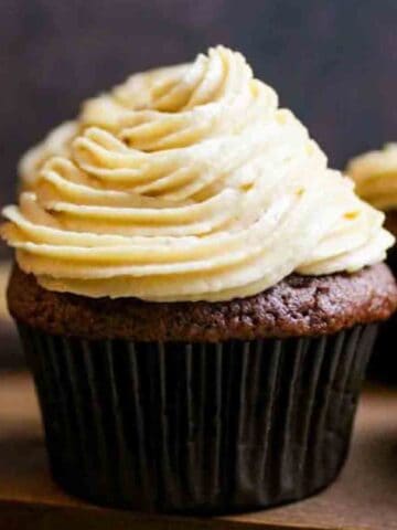 Peanut Butter Cream Cheese Frosting on a chocolate cupcake.