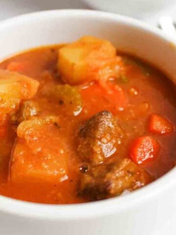 Stove Top Beef Stew in a white bowl.