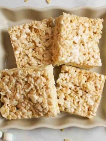 dairy free rice krispie treats in a square plate.