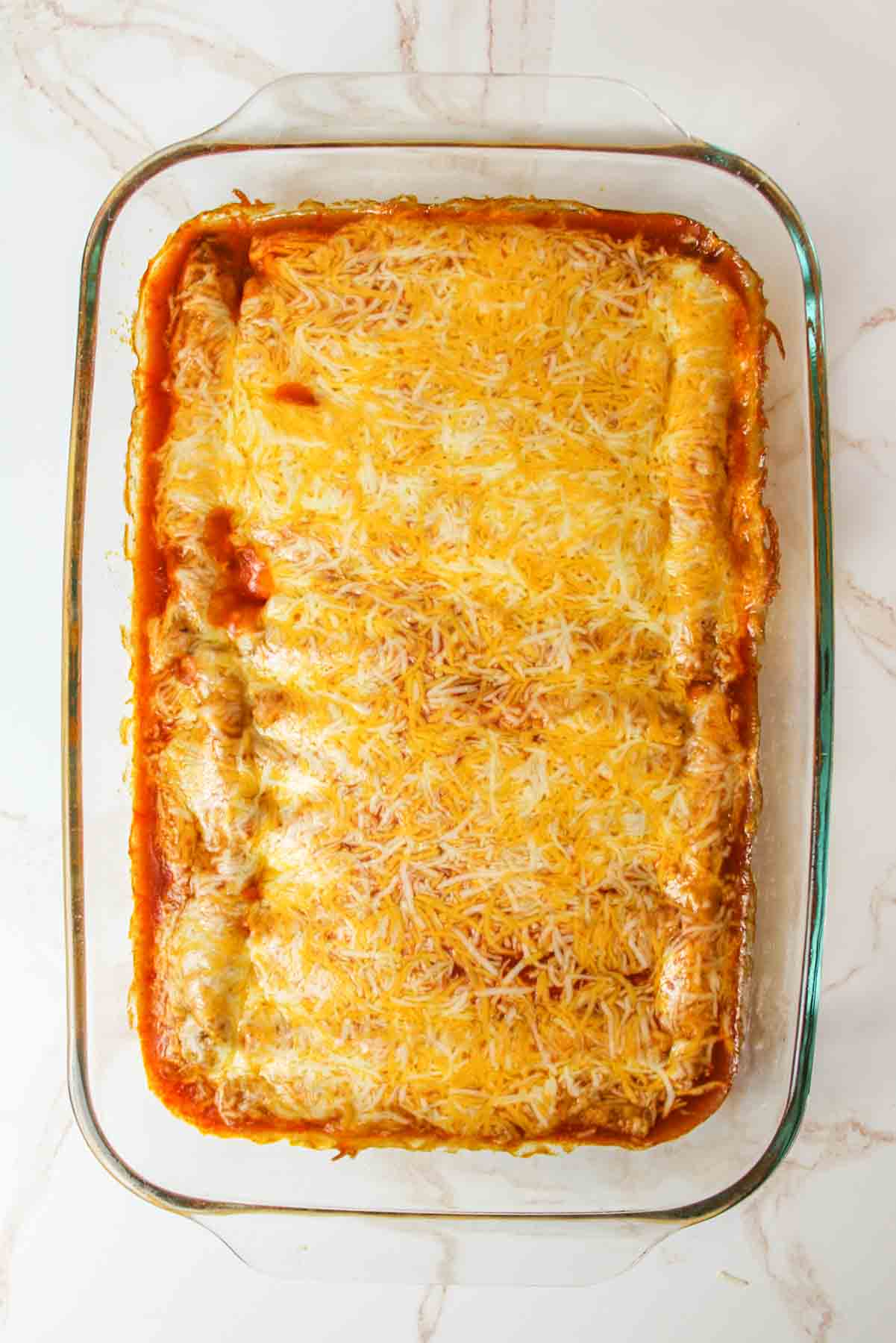 baked taquitos enchiladas in 9x13 baking dish.