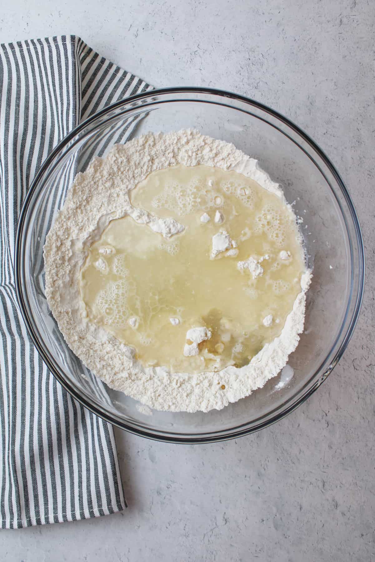 warm water added to dry yeast flour mixture in mixing bowl