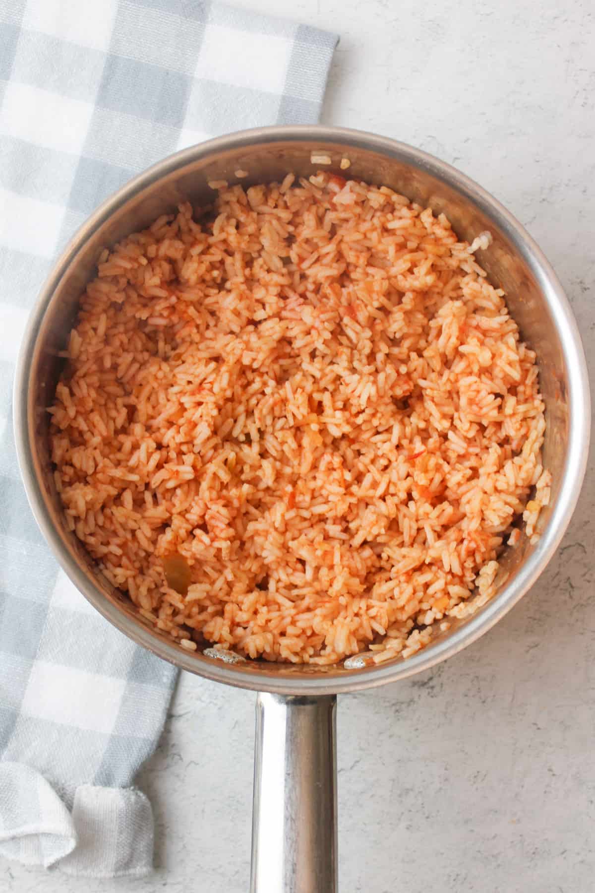 fluffed salsa rice in a pot.