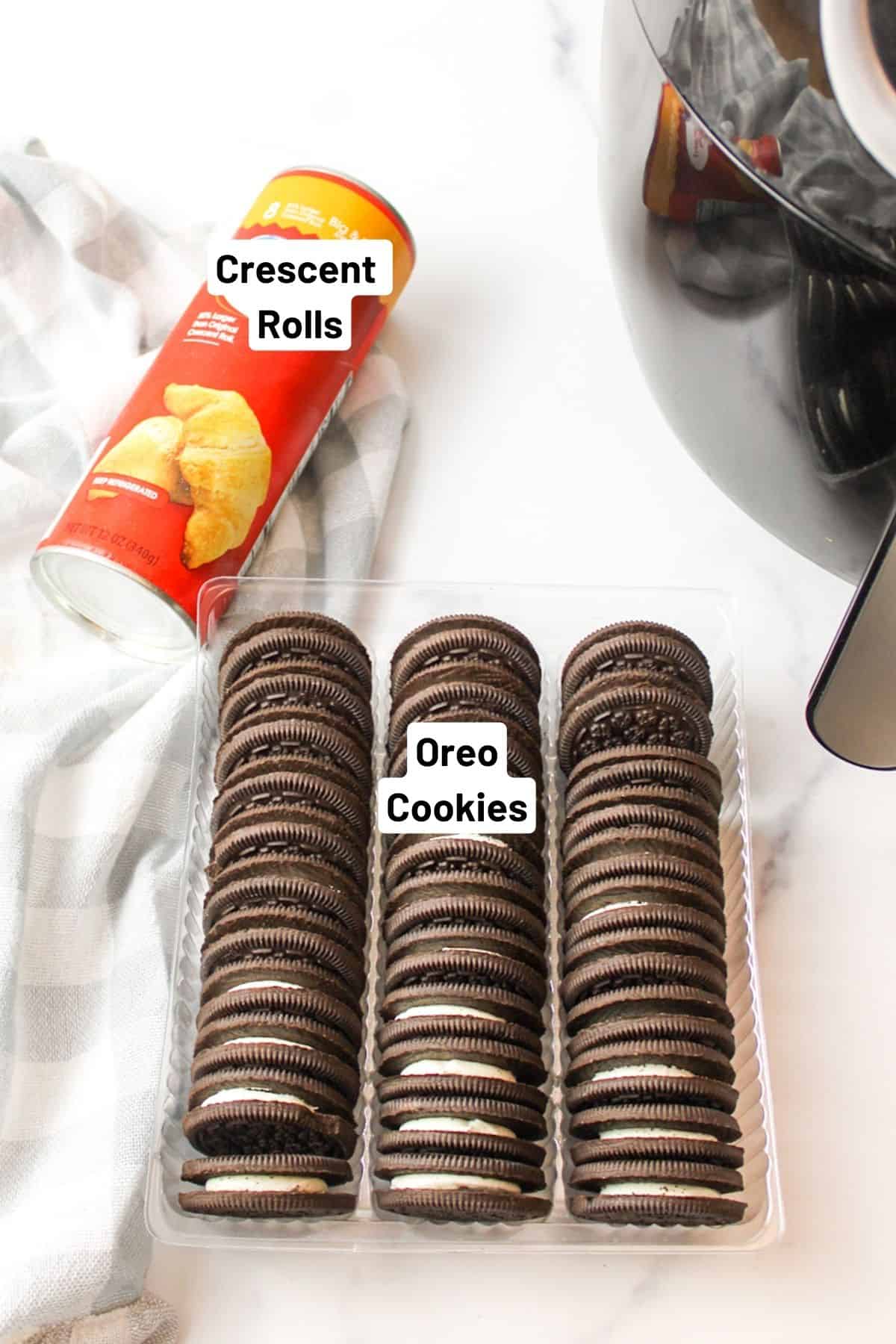 oreos and a can of crescent roll dough next to an air fryer