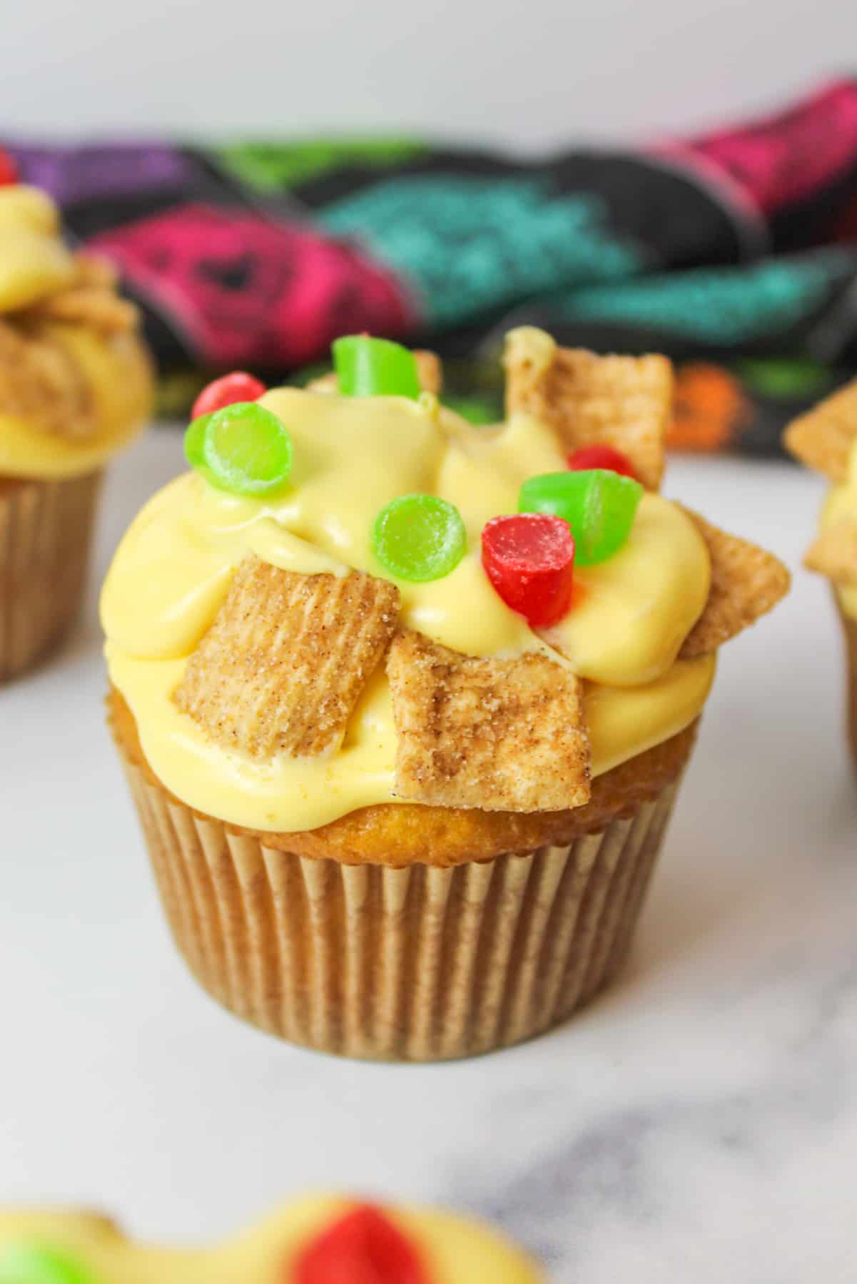 a close up of a nacho themed cupcake