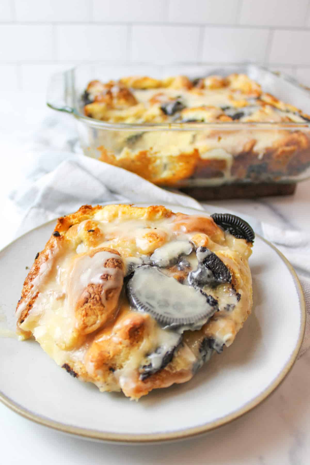 a serving of oreo bread pudding on a plate.