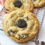 oreo chocolate chip cookies on a wire rack.