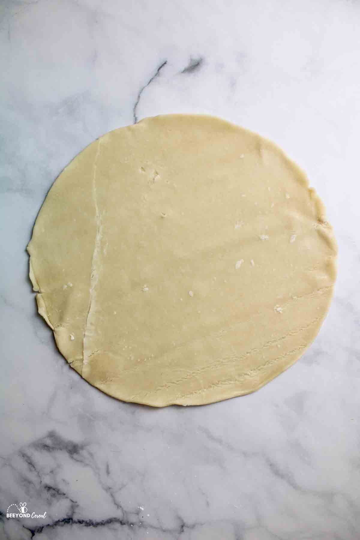 unrolled round pie crust.