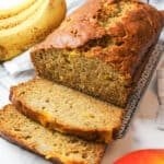 a sliced loaf of mango banana bread.