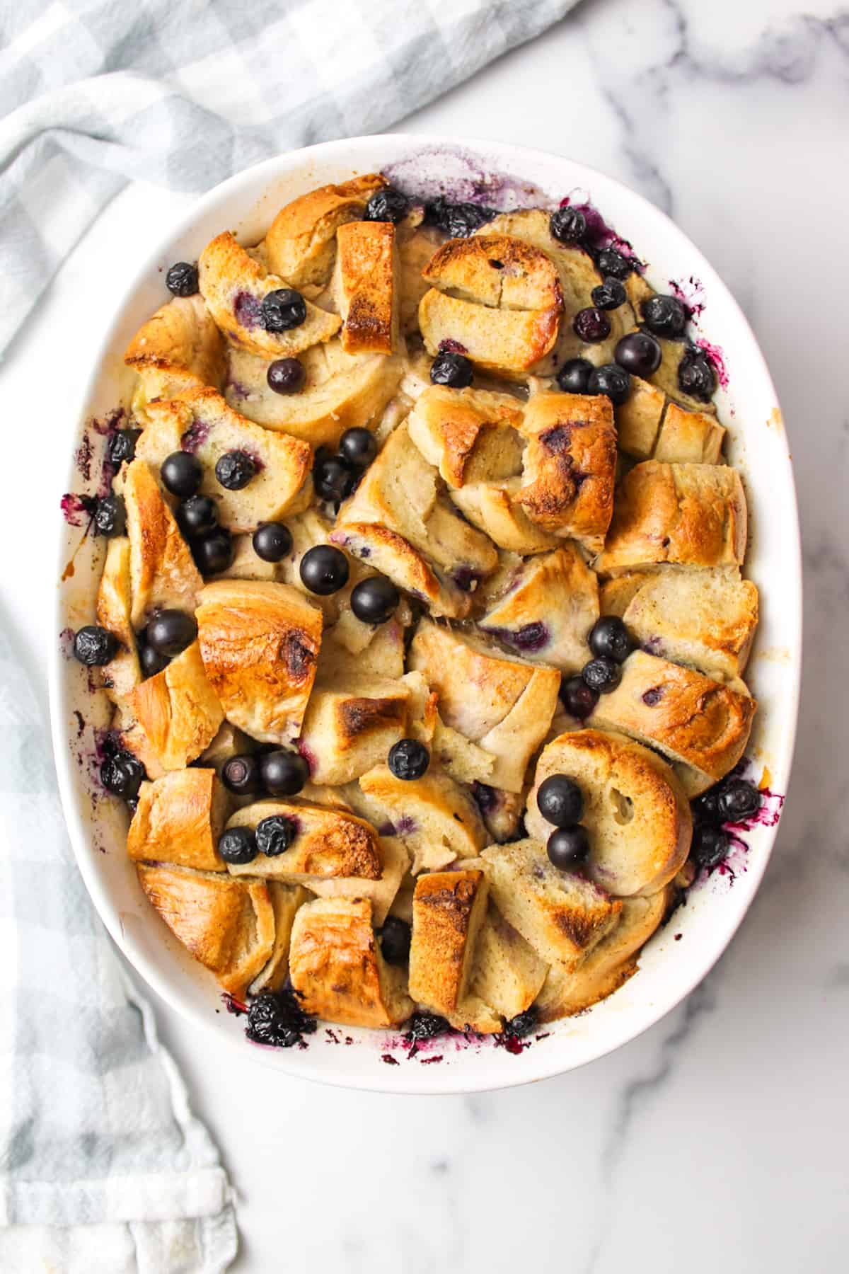 aerial view of baked blueberry bagel bread pudding