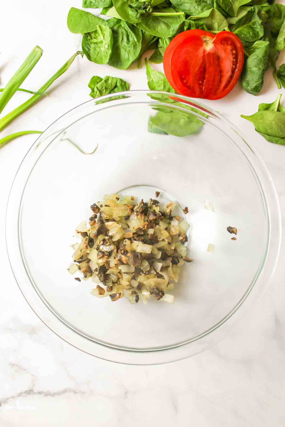 cooked mushroom and onions in a bowl.