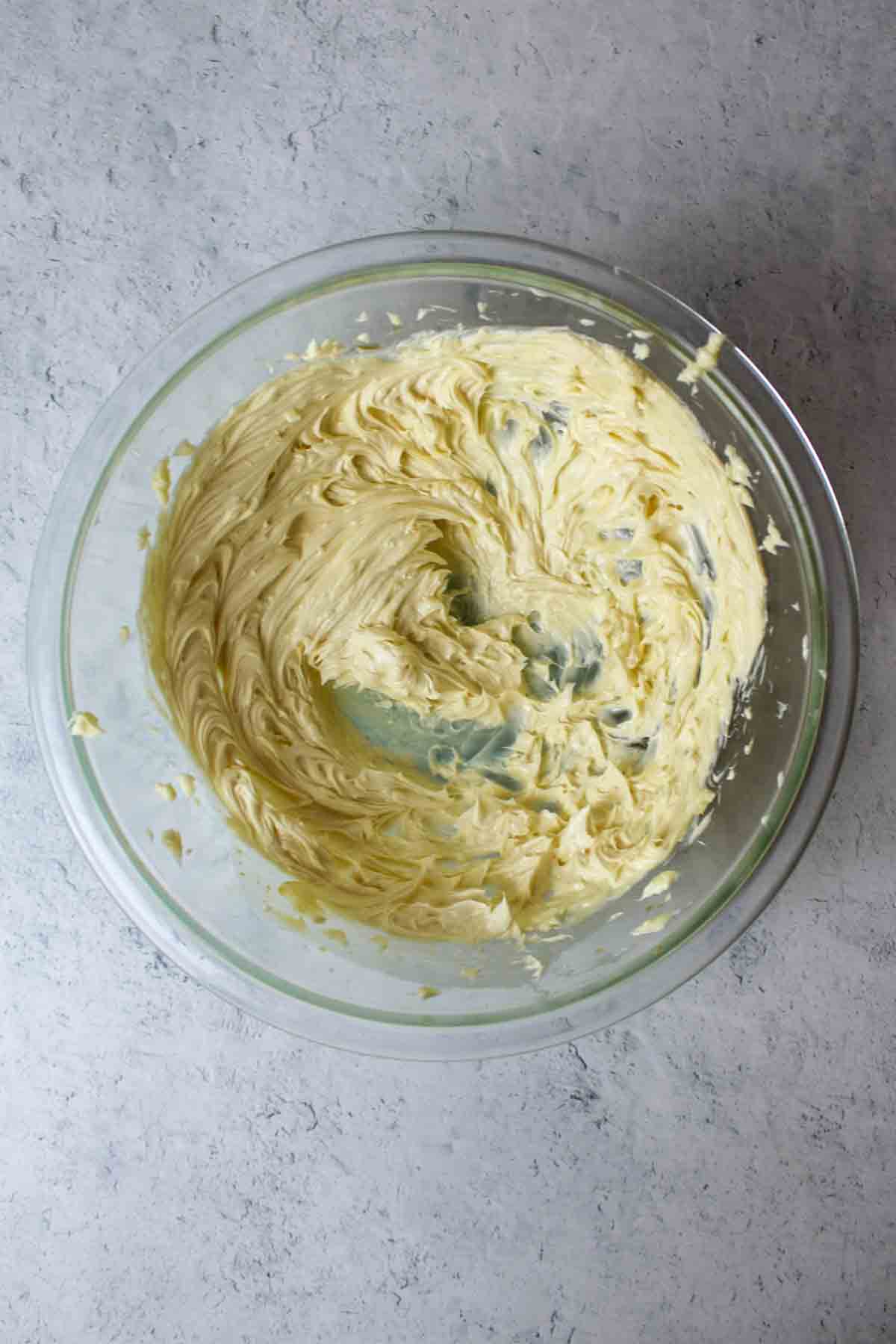 creamed butter in a mixing bowl.