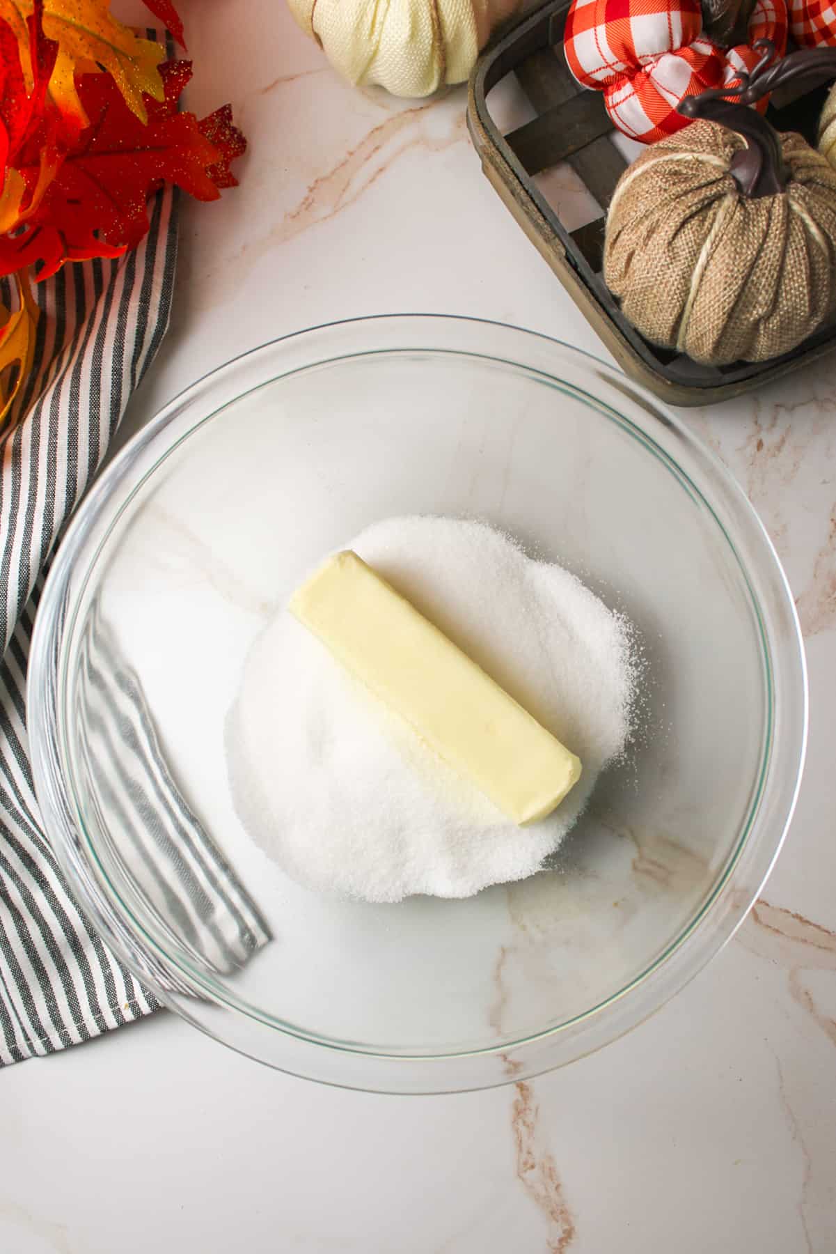 butter and sugar in a mixing bowl.