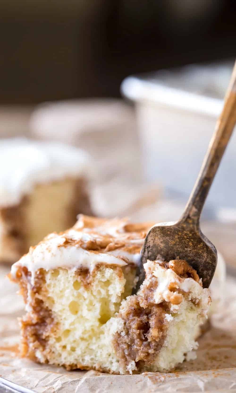 Cinnamon Roll Poke Cake by I Heart Eating