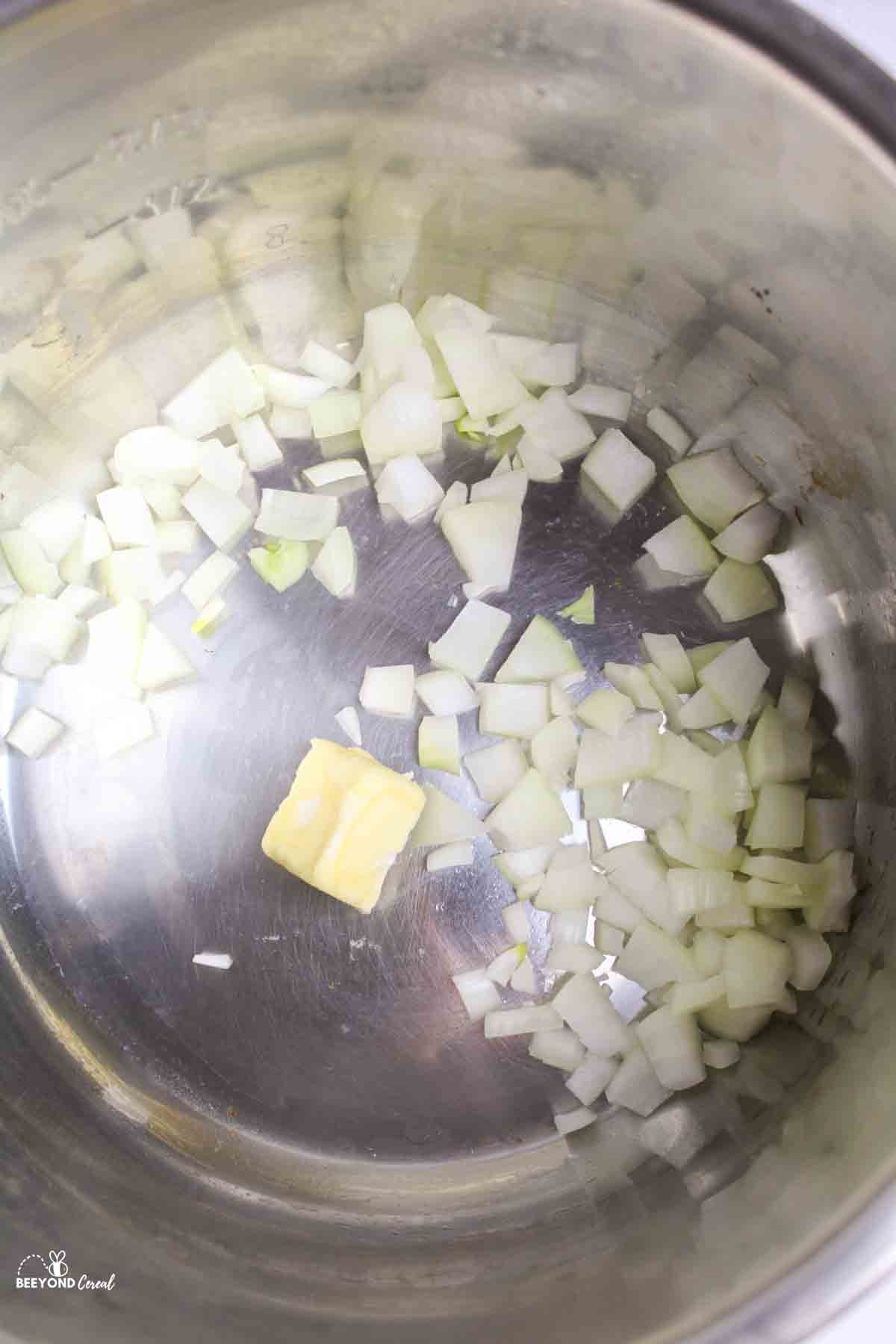 onions and butter in an instant pot liner