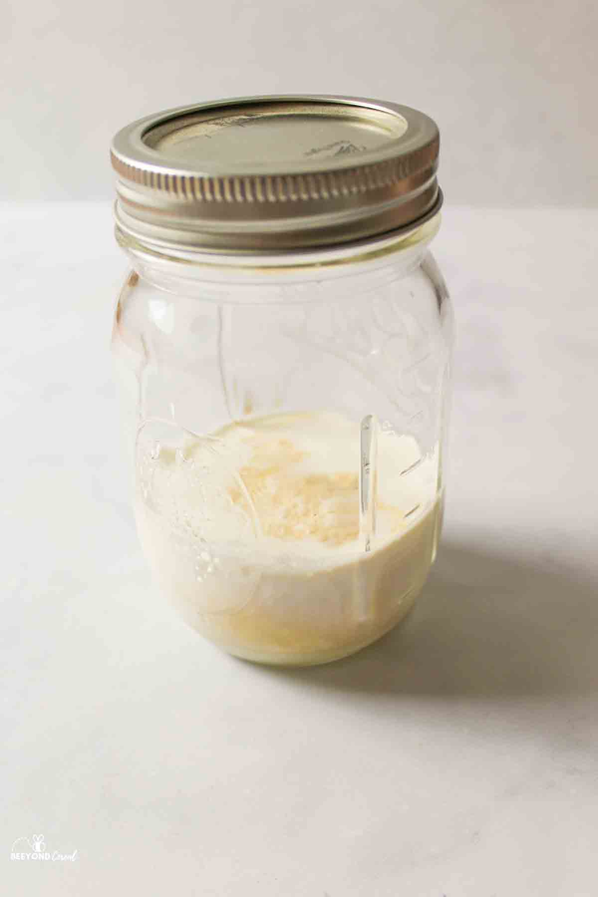 vanilla ice cream ingredients in a sealed mason jar