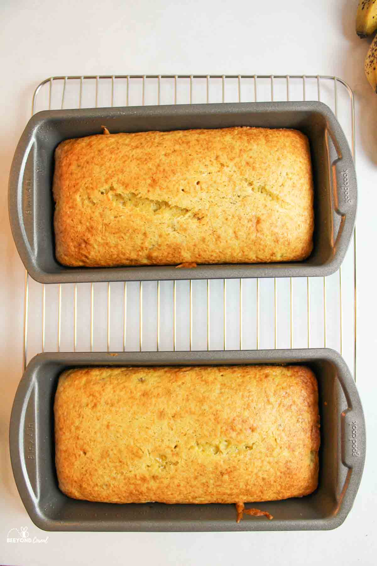 two baked loaves of cake mix banana bread.