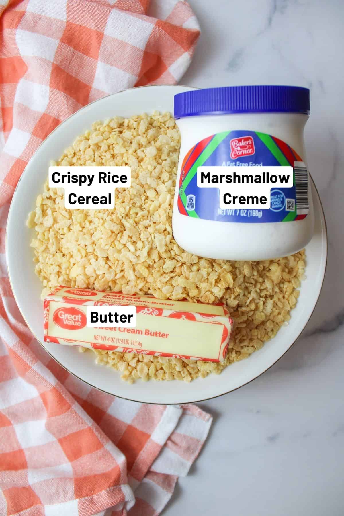 labeled ingredients needed to make rice krispies with marshmallow fluff.