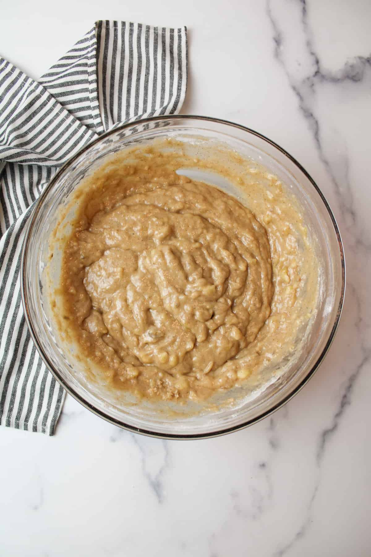 banana bread batter without eggs in a mixing bowl.