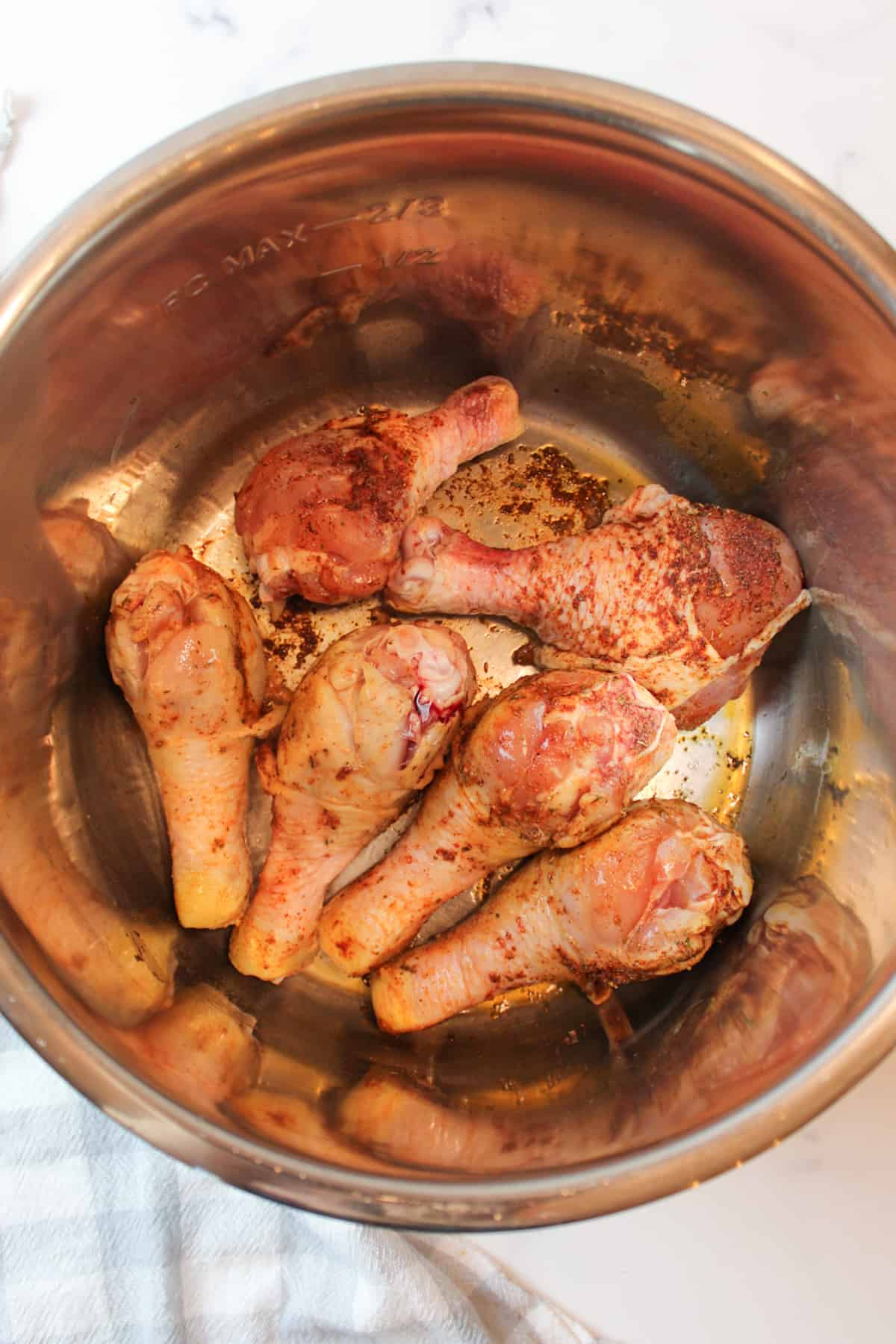 searing the sides of chicken legs in an instant pot