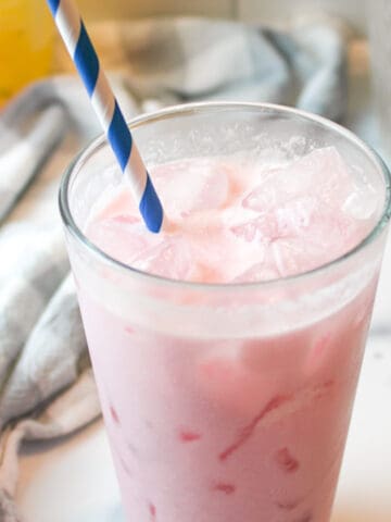 a glass cup filled with keto italian soda and ice.