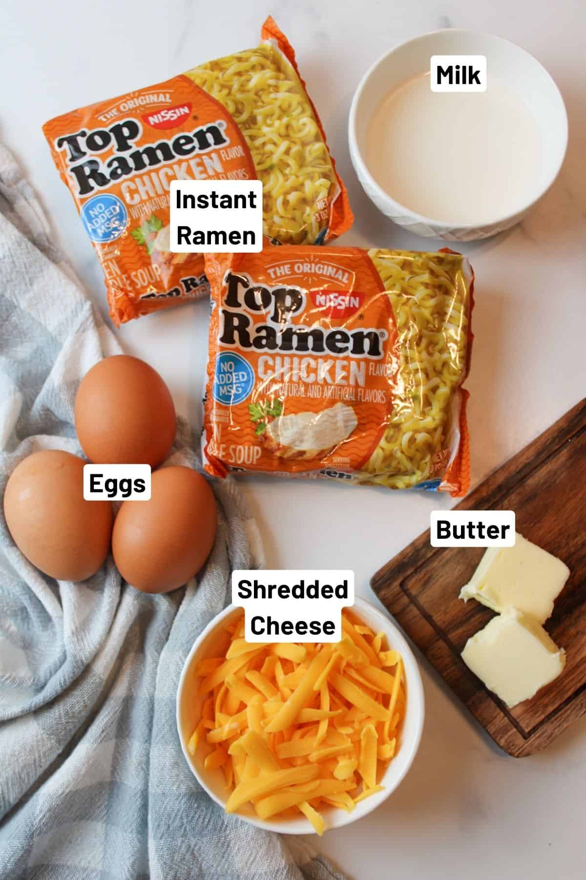 labeled ingredients needed to make ramen with egg and cheese.