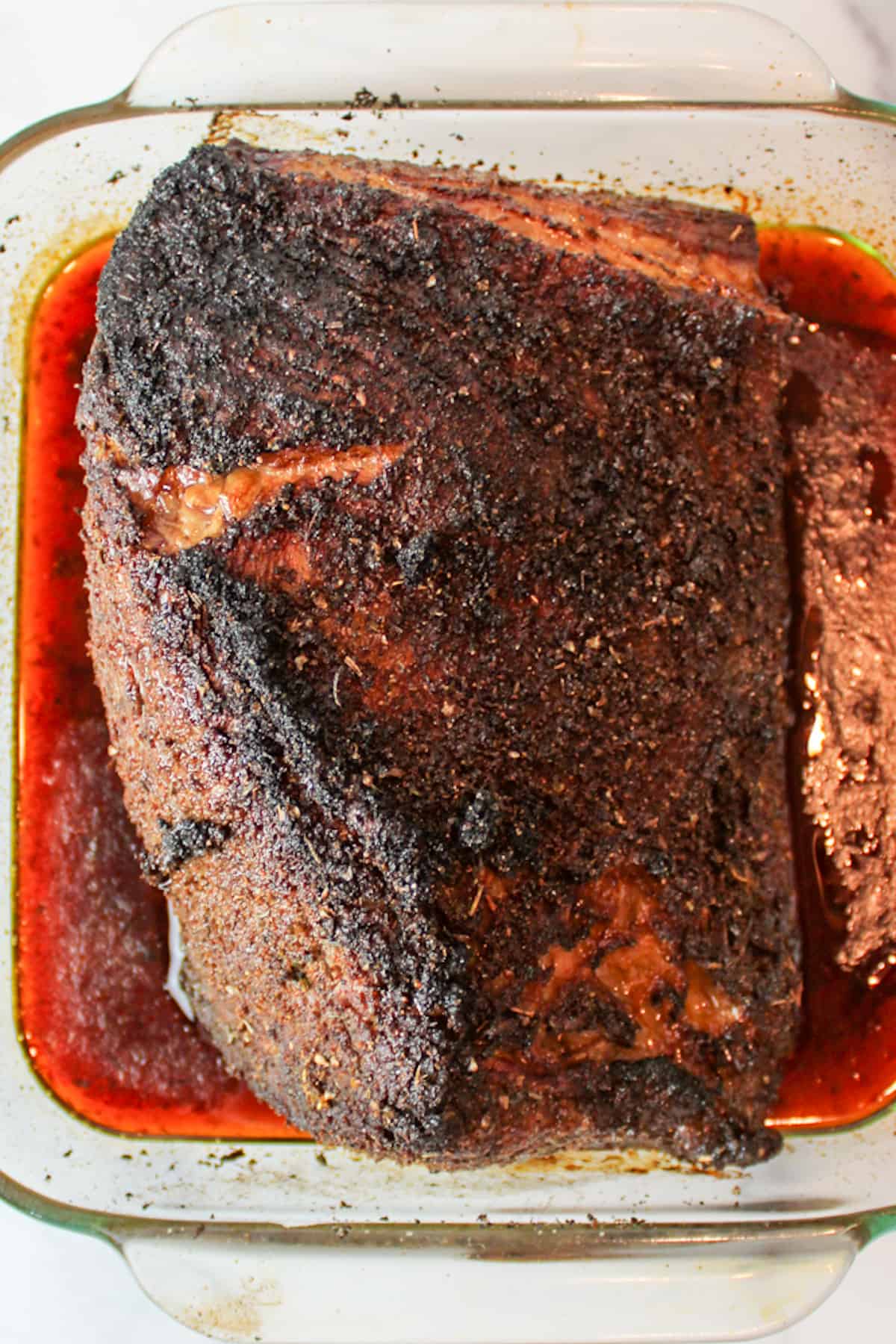cooked beef roast in a roasting pan