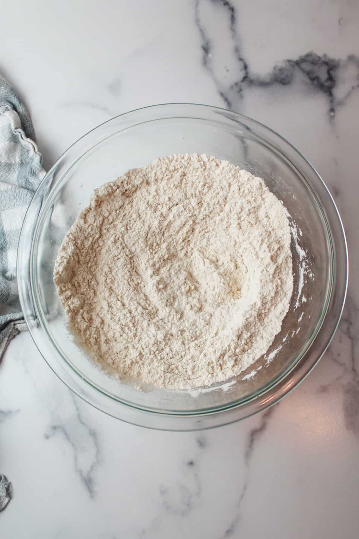 whisked yeast and flour mixture in a mixing bowl