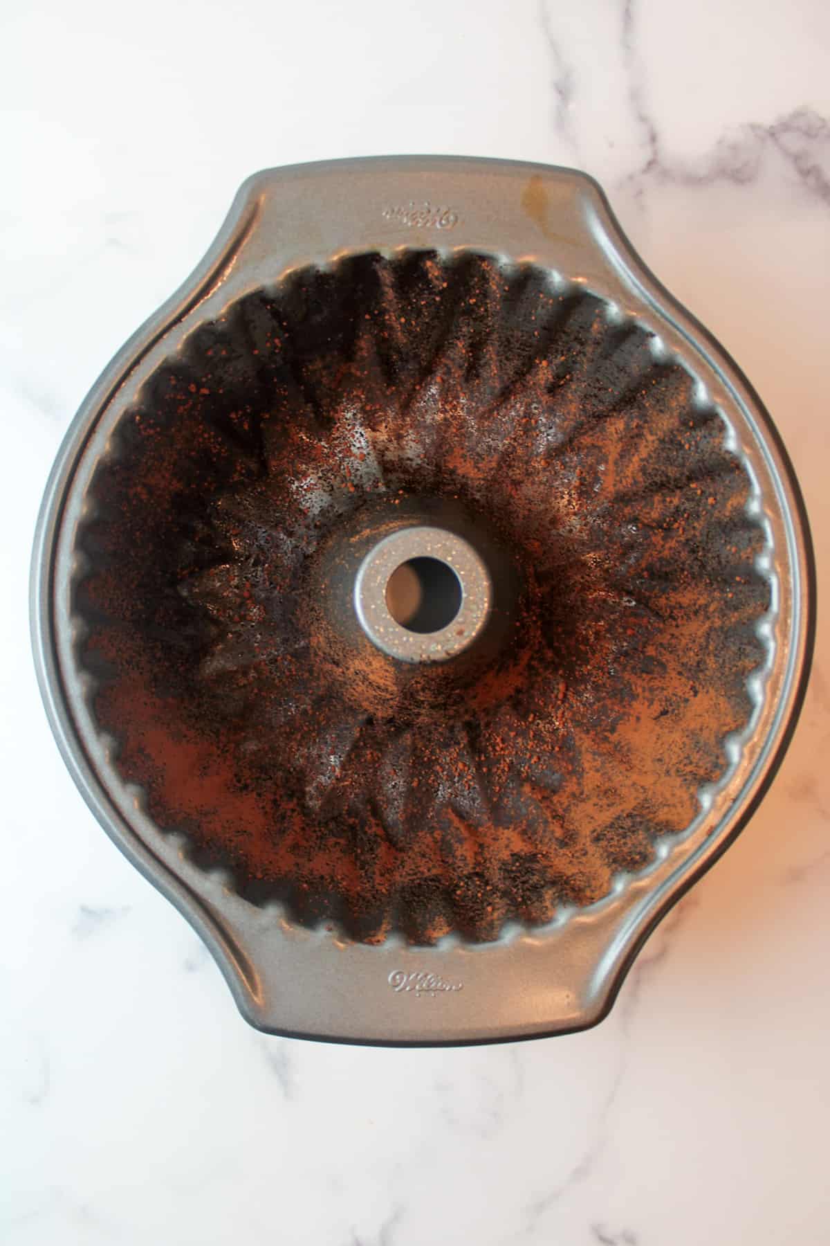 cocoa powder dusted bundt pan.