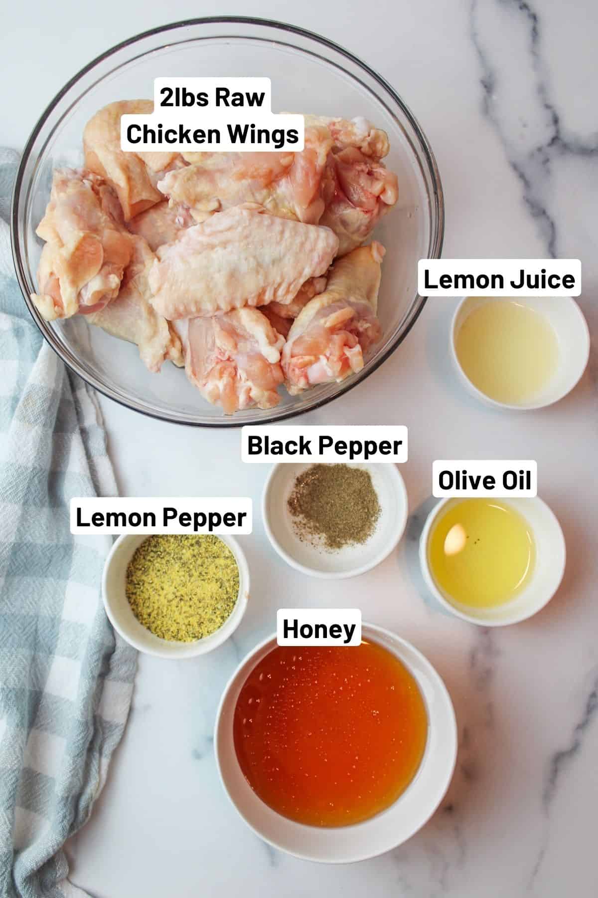 labeled ingredients needed to make honey lemon pepper wings.