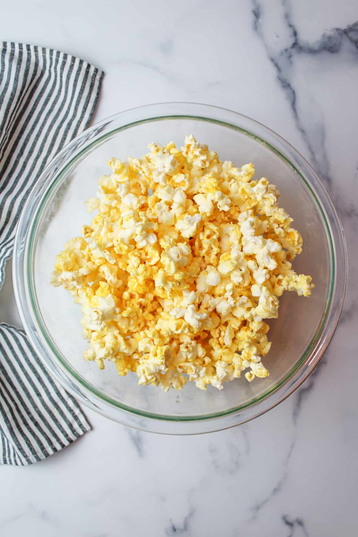 buttered popcorn in a mixing bowl.