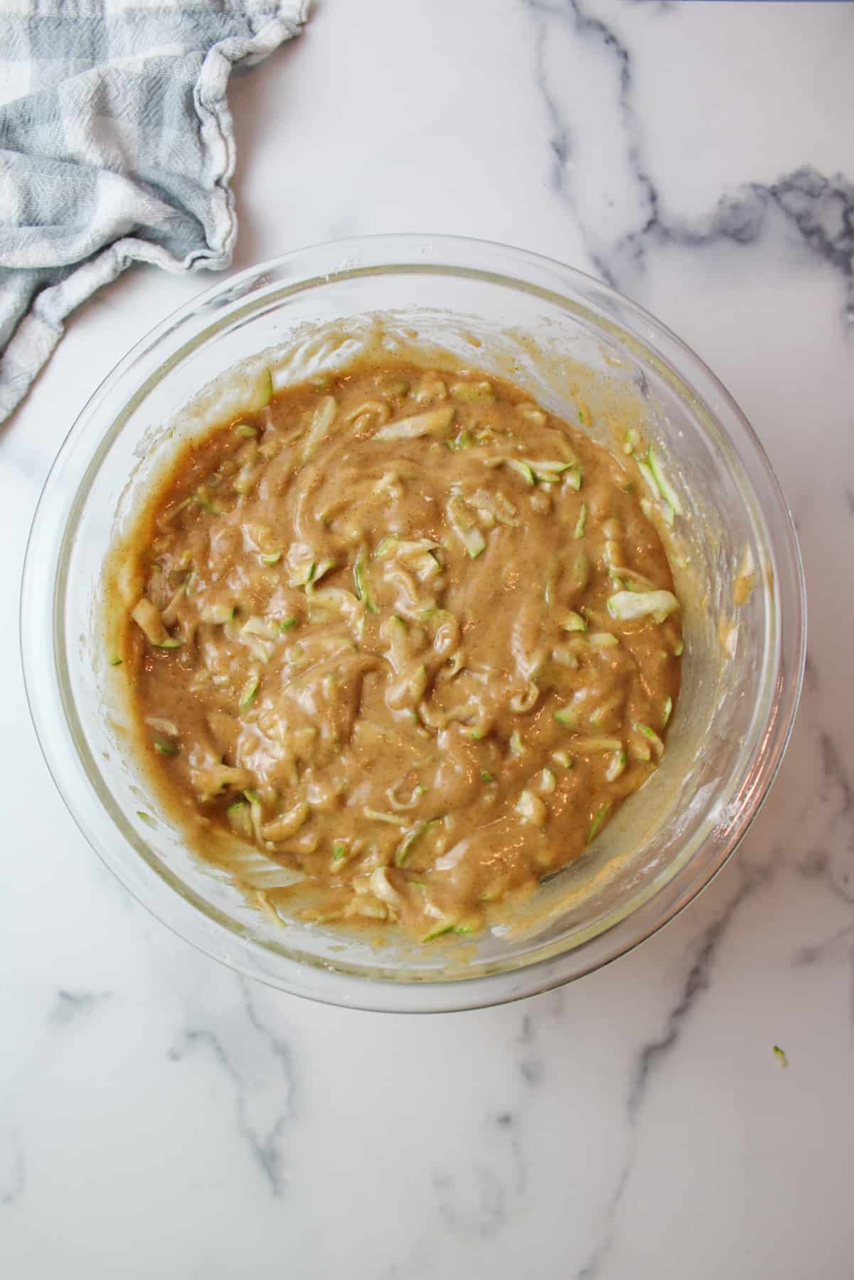 zucchini bread batter in a mixing bowl