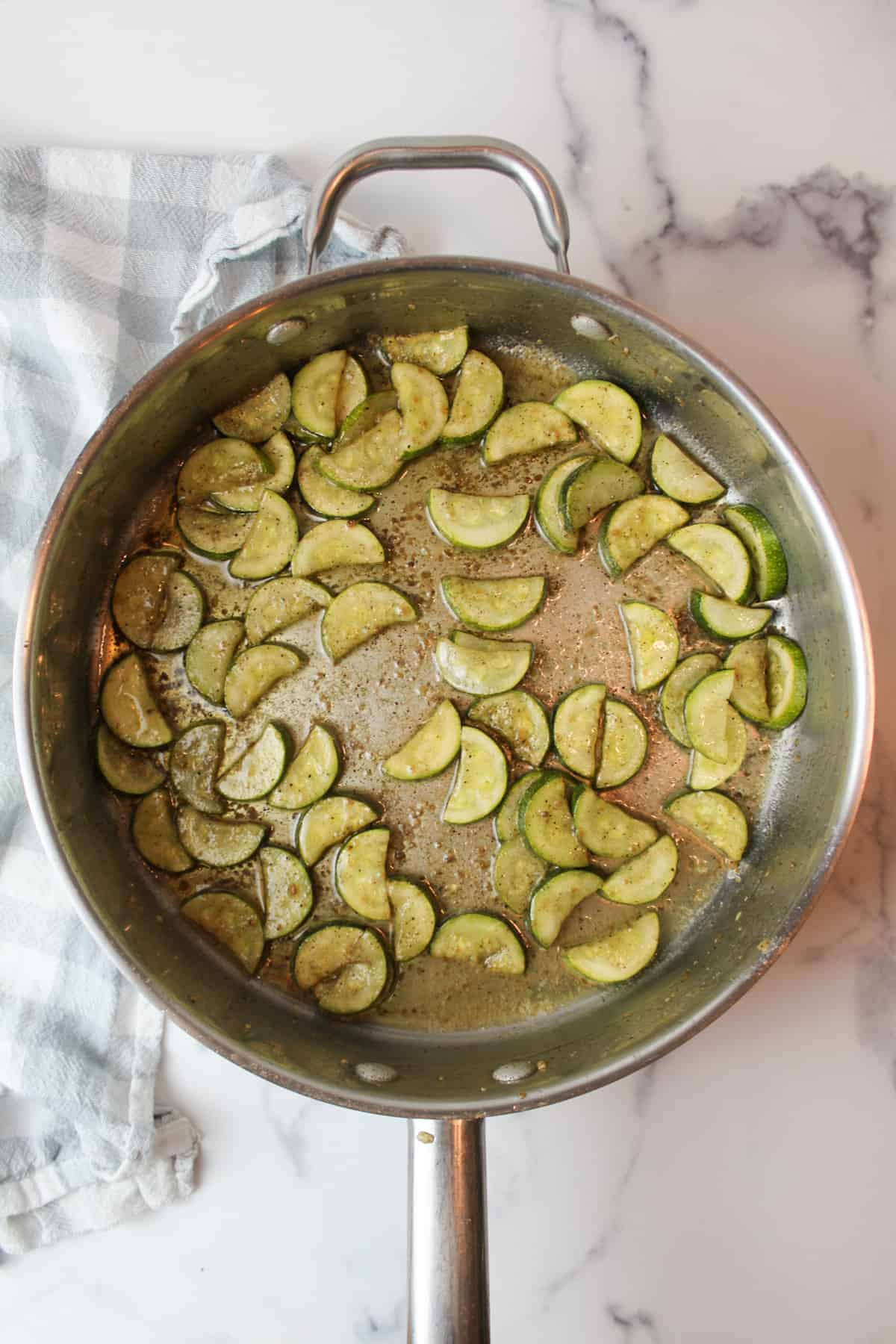 cooked seasoned chopped zucchini in a large pot.