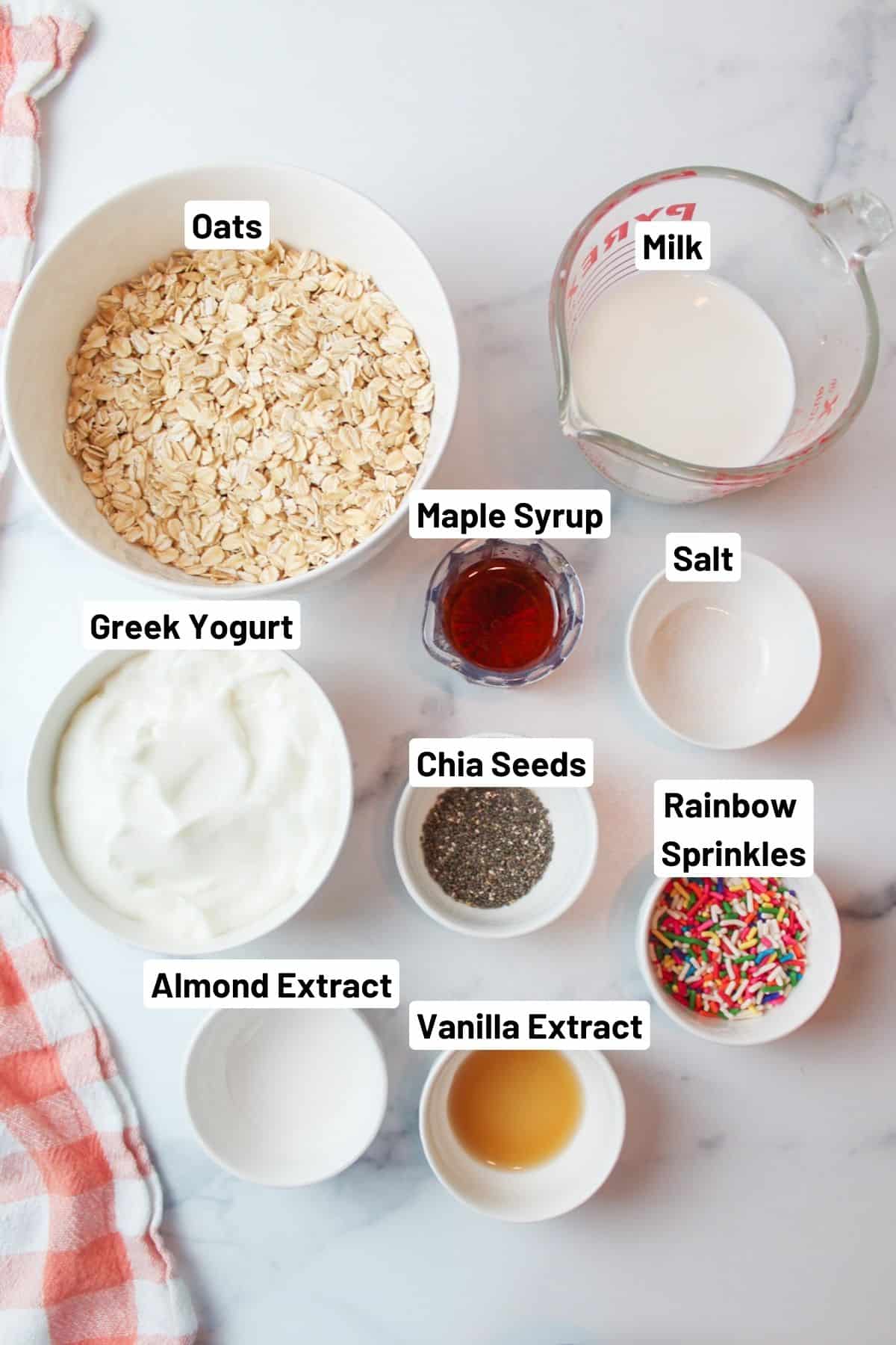 labeled ingredients needed to make birthday cake overnight oats.