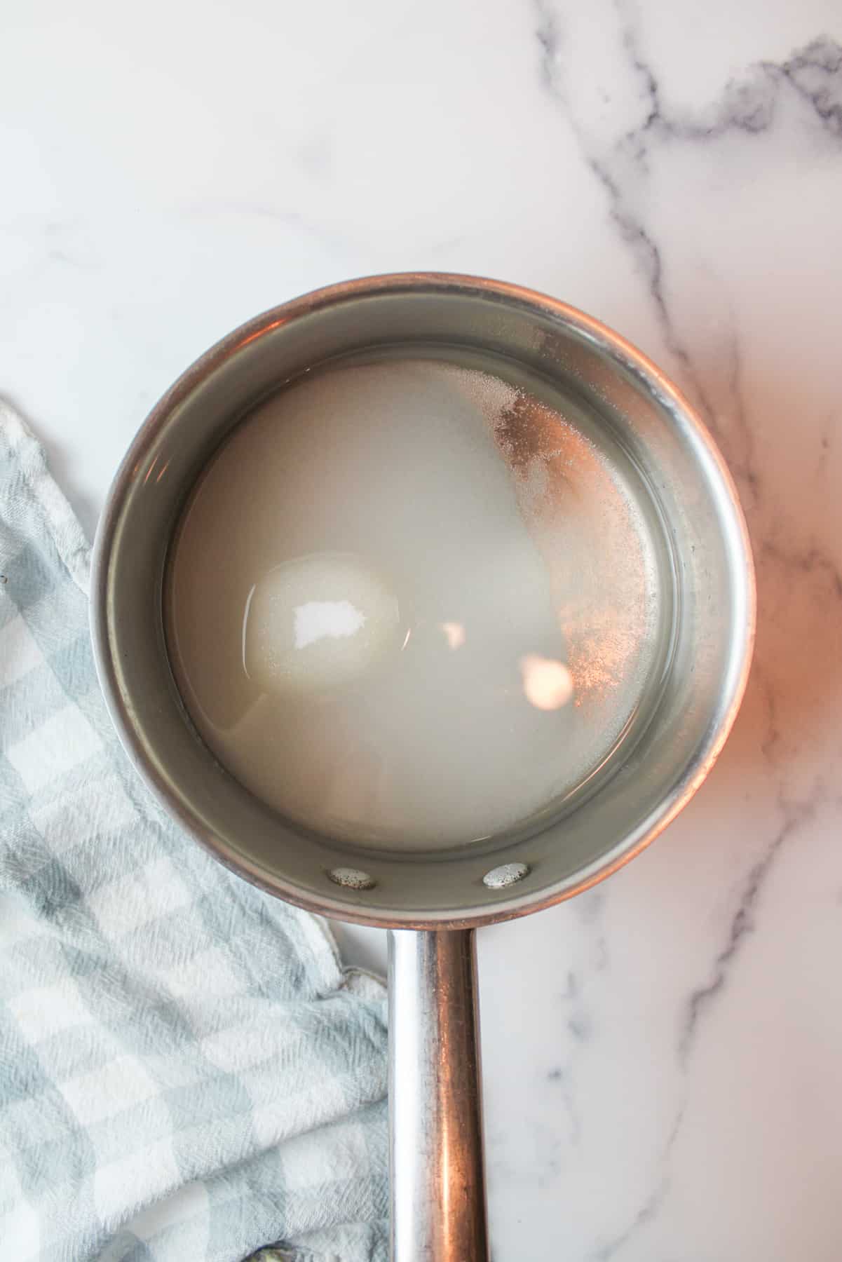 sugar and water in a small pot