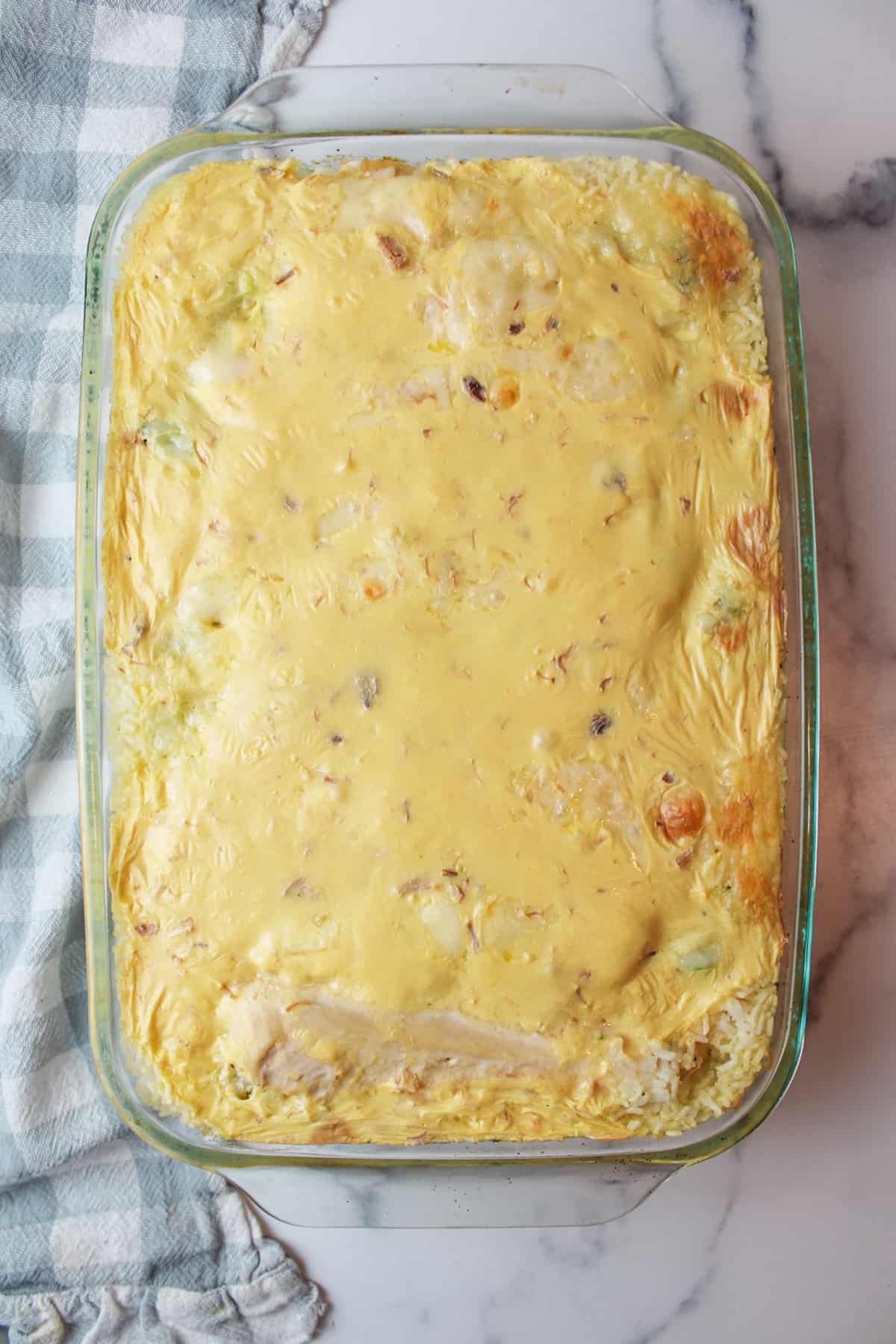 baked chicken broccoli rice casserole in baking dish.